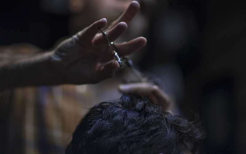 man getting haircut