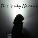 Sihloette of woman sitting down looking up as if to the sky