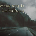 Driving across bridge in mountains when rainy and grey